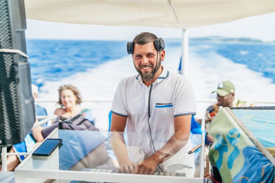 From Corfu Island: Antipaxos & Paxos Blue Caves Boat Cruise - The ride back, music, and Greek dancing