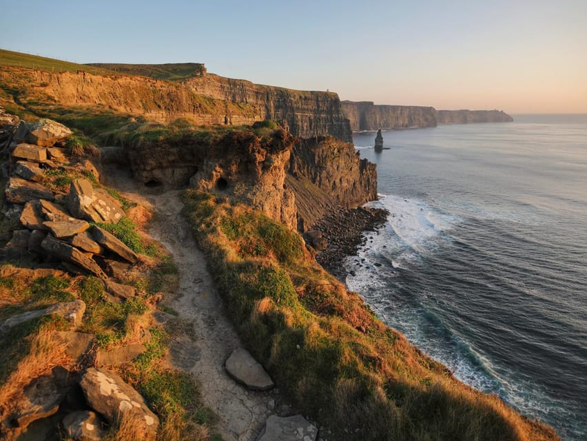 From Dublin: Cliffs of Moher, Boat Tour & Aillwee Cave - Meeting at the Molly Malone Statue