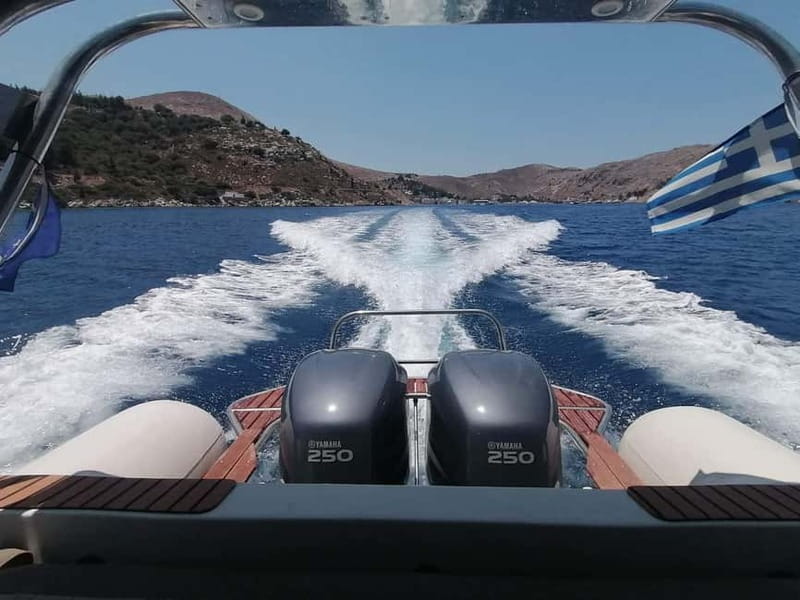 From Faliraki : Speedboat tour kalithea caves&antony kouin - Reading the cliffs at Traganou Bay