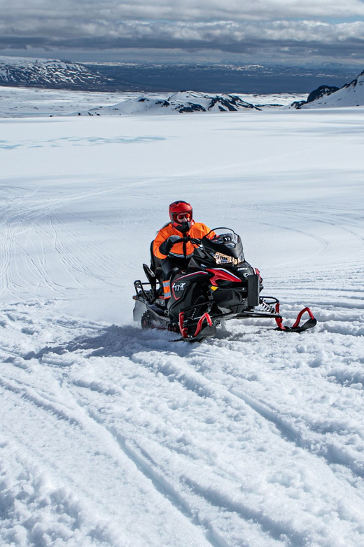 From Geysir: Snowmobiling & Ice Cave on Langjökull Glacier - Getting suited up for Langjökull