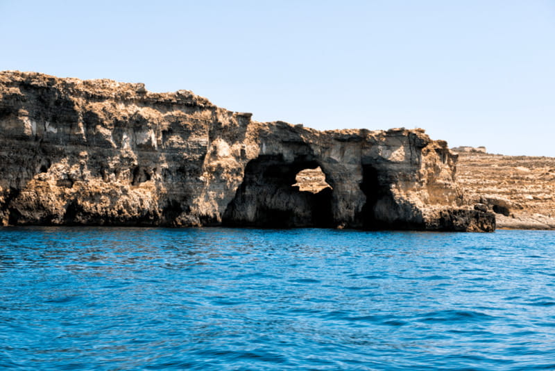 From Gozo:Around Comino, Blue Lagoon, Crystal Lagoon & Caves - Boat comfort, group size, and swimming setup