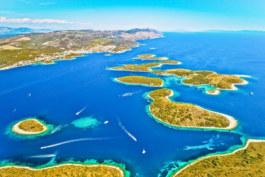 From Hvar: Blue and Green Cave Day Tour - Stiniva Cove: the best swim of the day for many people