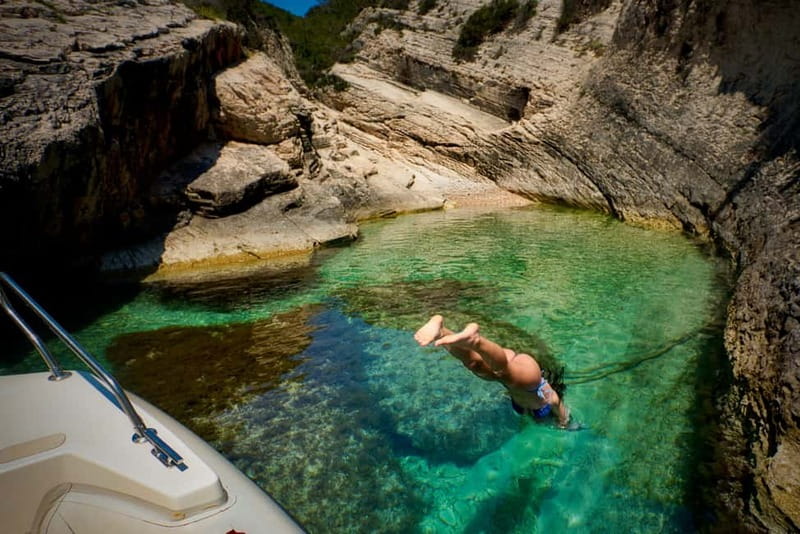 From Hvar: Blue Cave and Pakleni Islands Group Tour - The Blue Cave visit and its extra fee