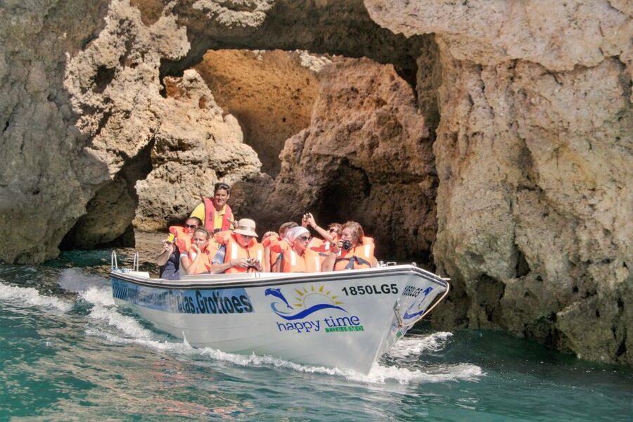 From Lagos: 2.5-Hour Guided Coastal Boat Tour & Grotto Visit - Swimming beside the cliffs