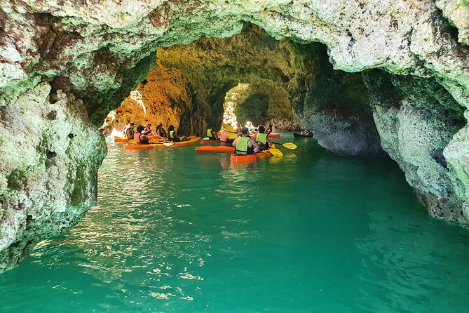 From Lagos: Kayak Tour of Ponta da Piedade Caves on Catamaran - Paddling through caves and along the rock formations