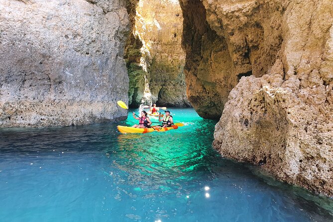 From Lagos: Kayak Tour of Ponta da Piedade Caves on Catamaran - Launching from the boat near the cliffs