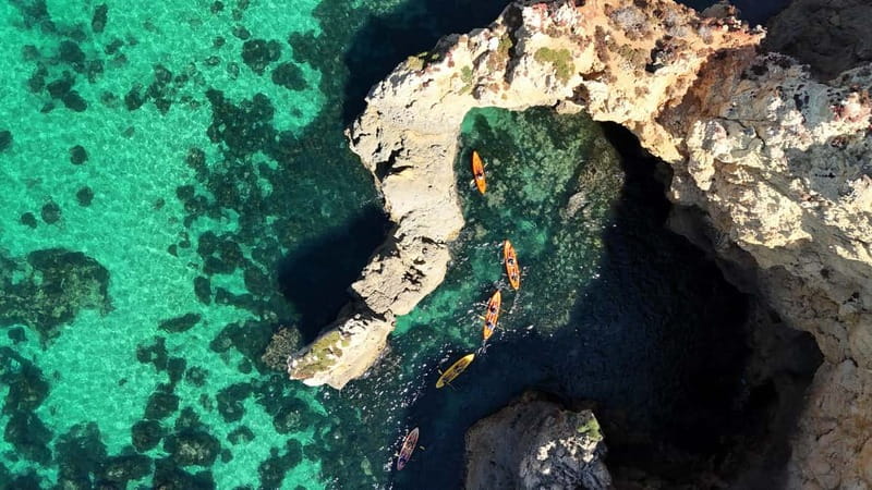 From Lagos: Ponta da Piedade Caves Kayak Tour from Catamaran - Guides, Safety, and Group Atmosphere