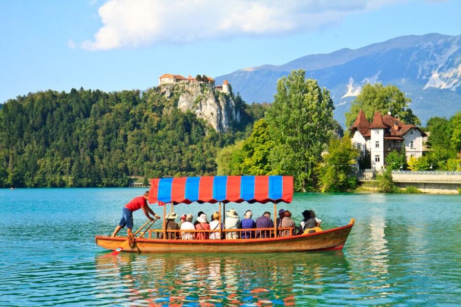 From Ljubljana: Lake Bled & Postojna Cave with Entry Tickets - Lake Bled, the day’s postcard view