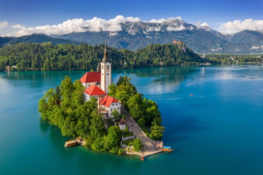 From Ljubljana: Lake Bled & Postojna Cave with Entry Tickets - Bled Castle above the water