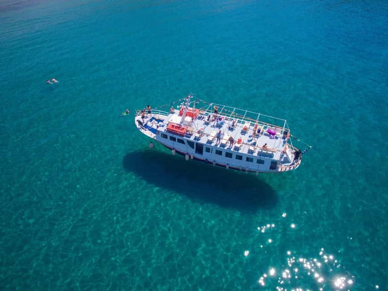 From Naxos: Koufonisia Boat Cruise and Rina's Cave w/ Lunch - A Greek BBQ lunch on Kato Koufonisi