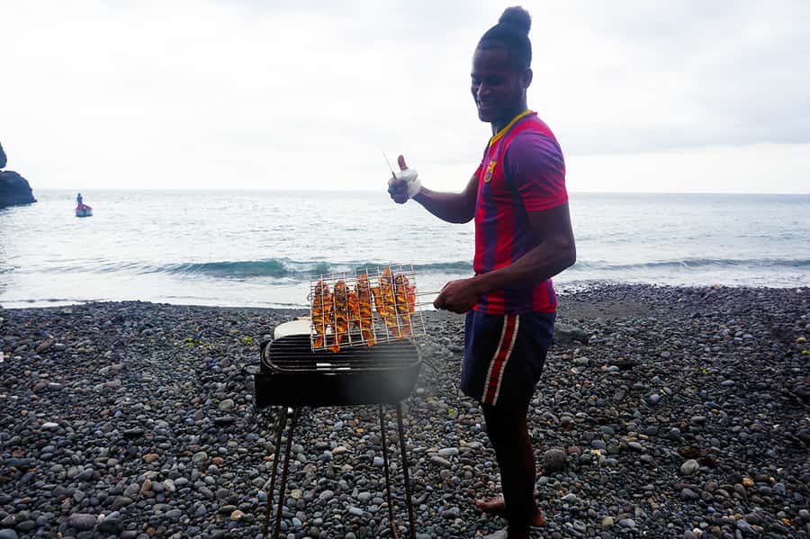 From Praia: Boat Trip, Snorkeling, Cave & BBQ on the Beach - A 30-minute ride on a traditional fishing boat