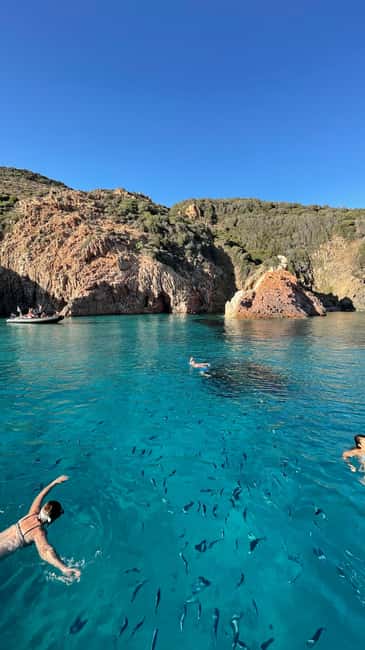 From Sagone/Cargèse: Piana Sea Caves & Snorkeling Boat Tour - Omigna Tower gives the trip a historical opening