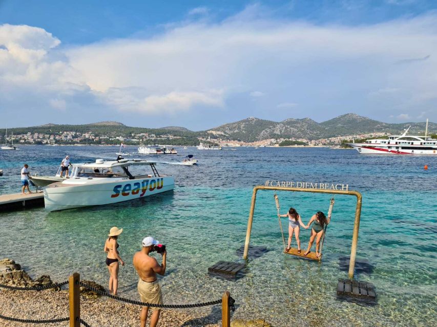 From Split: Luxury Cabin Boat Tour to The Blue Cave and Hvar - Stiniva Cove from the water