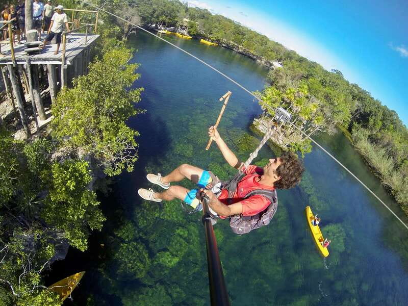 From Tulum: Four-Cenote Adventure - Large Cenote Naval: two zip lines and a canoe ride