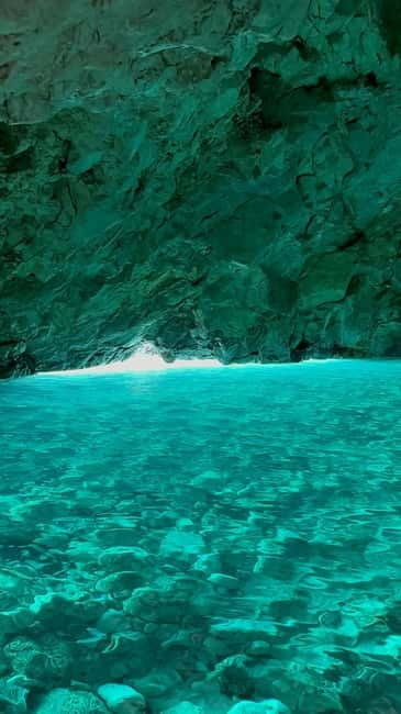 From Vlore: Blue Cave and Grama Bay Adventures - Blue Cave is the visual centerpiece
