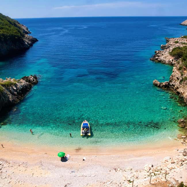 From Vlore: Haxhi Ali Cave & Karaburun Beach Speedboat Tour - St. Vasil Beach gives you the longest proper break