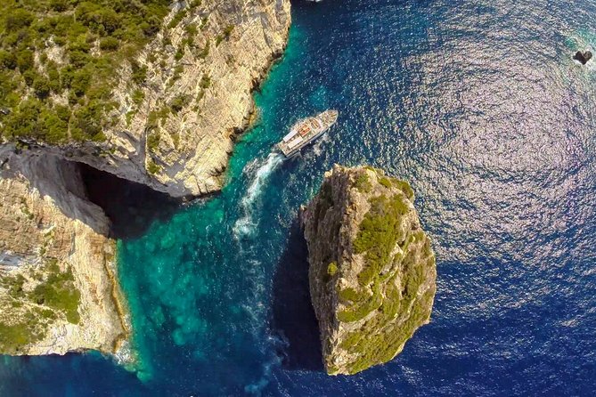 Full-Day Boat Tour of Paxos Antipaxos Blue Caves from Corfu - Pickup, ports, and the very early morning