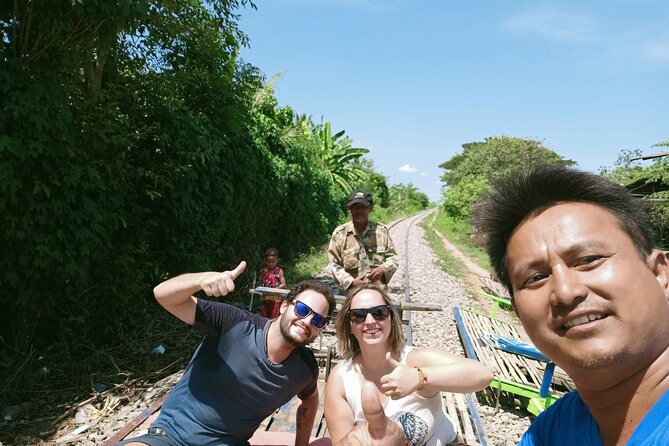 Full Day tour .City tour.Countryside.Bamboo Train.Secret Bat Cave - A fishing village and everyday Cambodian life