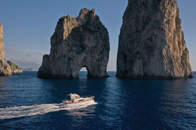 Futura Capri/Amalfi Private Boat Tour - Grottos' Visit - Faraglioni, Capri’s essential boat view