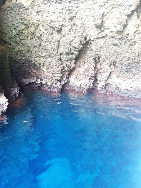 Giardini Naxos: Isola Bella and Grottos Cruise with Aperitif - Seeing Taormina from inside the Day Grotto