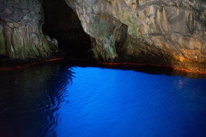 Grotte Di Capo Palinuro - Leaving the port in a traditional gozzo