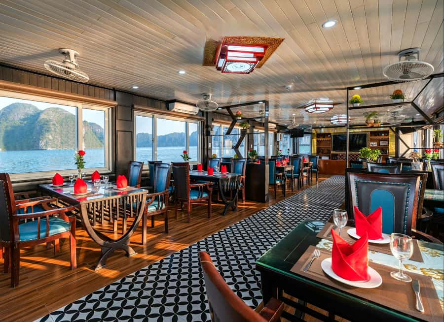 Halong Bay: Day Cruise with Caves, Kayaking & Sunset Party - Lunch with Dog Rock and Fighting Cock Islet