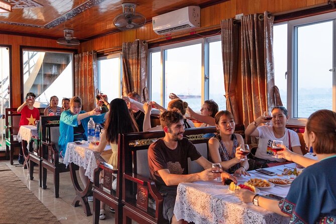 Halong Bay Day Tour With Titop Island, Cave, Kayak & Lunch - Sung Sot Cave and the climb through its chambers