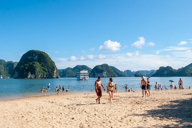 Halong Bay Day Tour With Titop Island, Cave, Kayak & Lunch - Guides, group size, and how the day feels