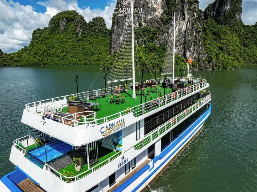 Halong Bay: Luxury Day Cruise, Caves, Kayak & Buffet Lunch - Titop Island, swimming, and the viewpoint
