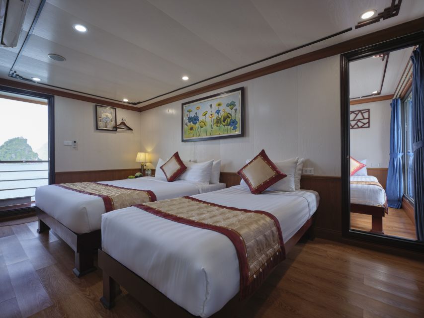 Hanoi: 2-Day Ha Long Bay 4-Star Cruise with Titov Cave - Finger Islet and the return to Tuan Chau
