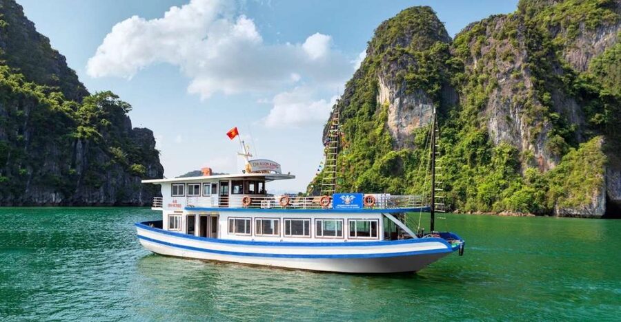 Hanoi: Halong Bay Day Trip with Titop Island, Cave, & Kayak - The Hanoi pickup and three-hour road journey