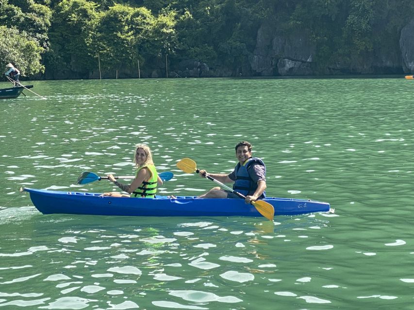 Hanoi: Roundtrip Halong Bay Islands, Caves, Kayaking & Lunch - Boarding at Tuan Chau Port around noon