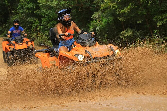 Hidden Cenote Swim & ATV Jungle Adventure with Transportation - Cooling off in an open-air cenote