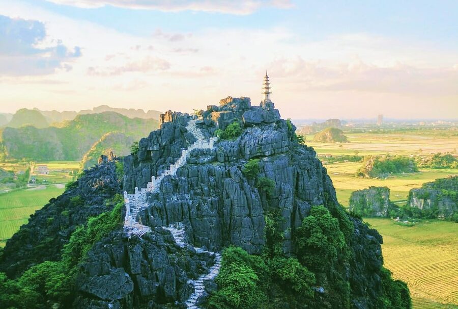 Hoa Lu, Tam Coc, & Mua Cave Day Trip with Lunch & Limousine - A short bicycle ride through daily life