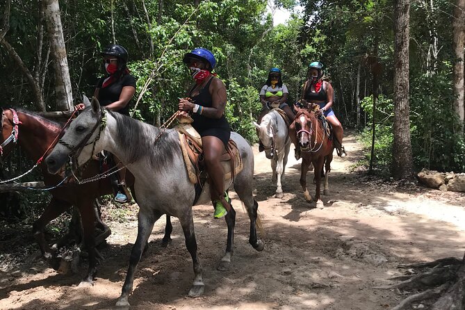 Horseback riding with ATV, zip lines and cenote, lunch and transfer - Zip lines over the jungle canopy