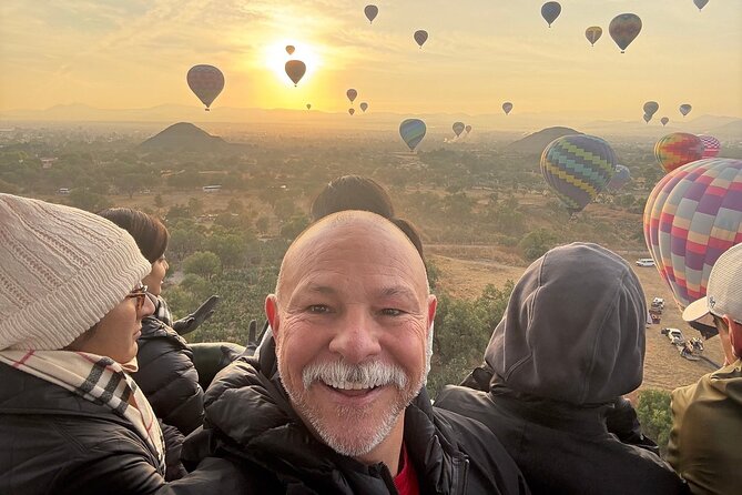 Hot Air Balloon Flight with Breakfast Cave and Pyramids Tour - Walking the pyramids with a local guide
