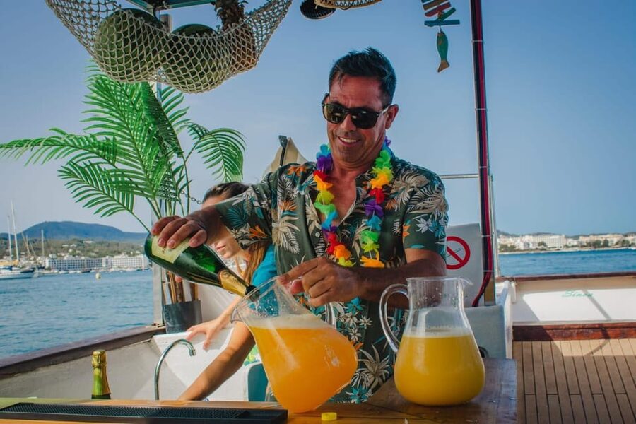 Ibiza by Sea: Coves, Caves, Water Sports & Open Bar - Cala Bassa: drinks, tapas, and a first taste of the coast
