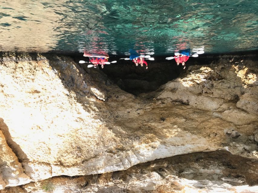 Ibiza: Sea Kayaking at Sunset and Sea Caves Tour - The Xuclar Cove break: snacks and a short swim