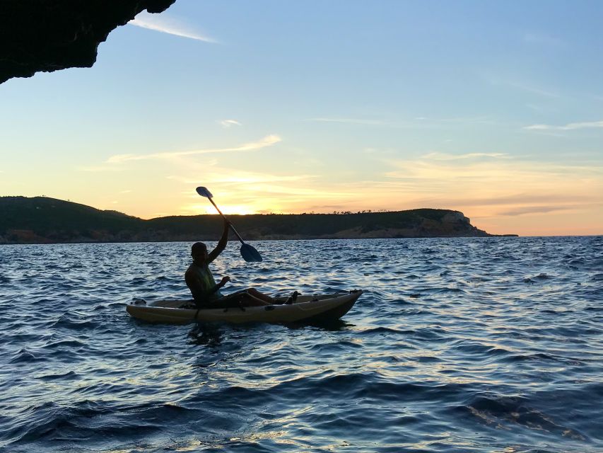 Ibiza: Sea Kayaking at Sunset and Sea Caves Tour - Portinatx and the first paddle toward the cliffs