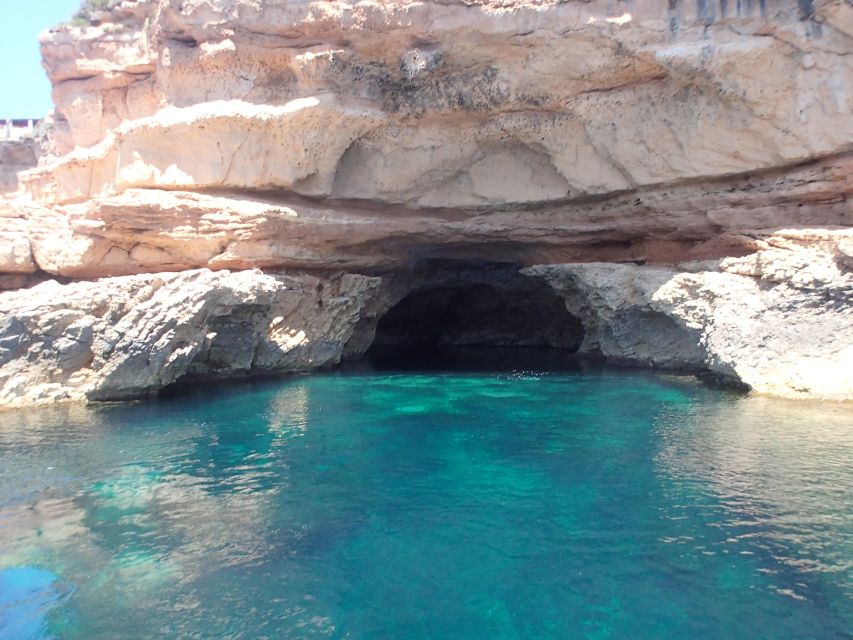 Ibiza: Snorkeling and SUP Paddle, Beach and Cave Tour - Cruising along Ibiza’s rugged western shore