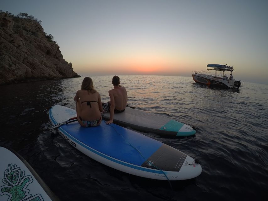 Ibiza: SUP & Snorkel Boat Tour with Caves, Drinks & Photos - Fresh fruit, tapas, and cold drinks on board