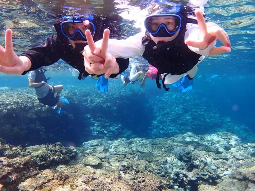 Ishigaki Island: Blue Cave Exploration & Snorkeling Tour - Walking through the limestone cave