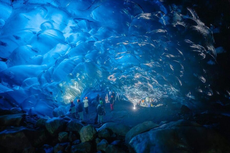 Jökulsárlón: Crystal Ice Cave Super Jeep Tour - Inside the cave: blue walls, white ice, and dripping water