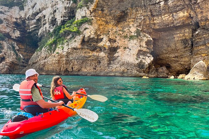 Kayak Paradise: Cala Portixol Snorkel, Cave & Cliff Jumping Tour - Starting with Cala el Pom’s clear water