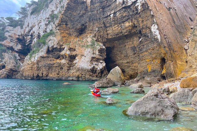 Kayak Paradise: Cala Portixol Snorkel, Cave & Cliff Jumping Tour - How the guides shape the outing