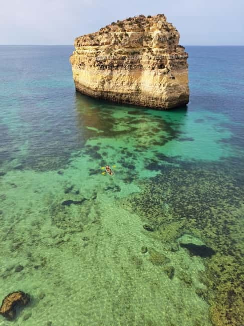 Kayak Tour Unexplored Caves + Benagil Cave - Paddling from the quiet cove toward Marinha