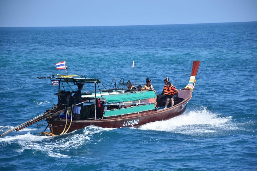 Koh Lanta: 4 Islands and Emerald Cave Tour by Longtail Boat - Swimming Through Emerald Cave on Koh Mook