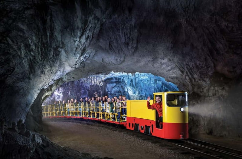 Koper/Trieste: Postojna Cave & Predjama Castle Tour & Ticket - Riding the train into Postojna Cave