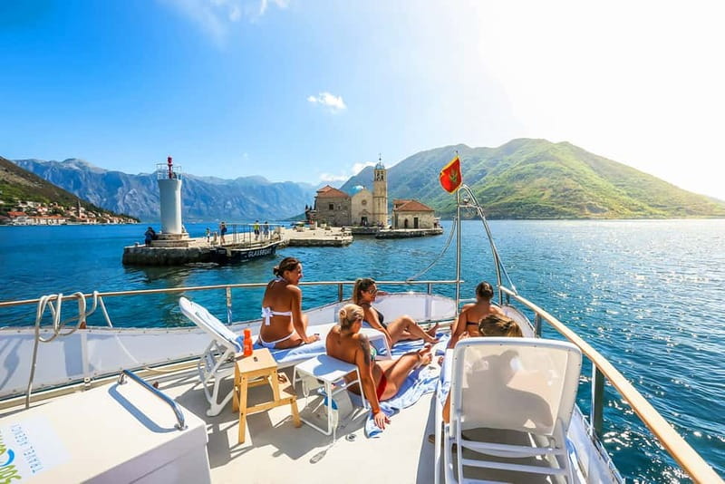 Kotor Bay: Full-Day Catamaran Cruise with Blue Cave Visit - Leaving Kotor Bay from the sheltered inner waters