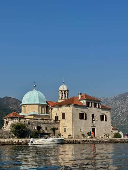 Kotor: Our Lady of the Rocks and Blue Cave Group Boat Tour - Crossing Boka Bay by speedboat